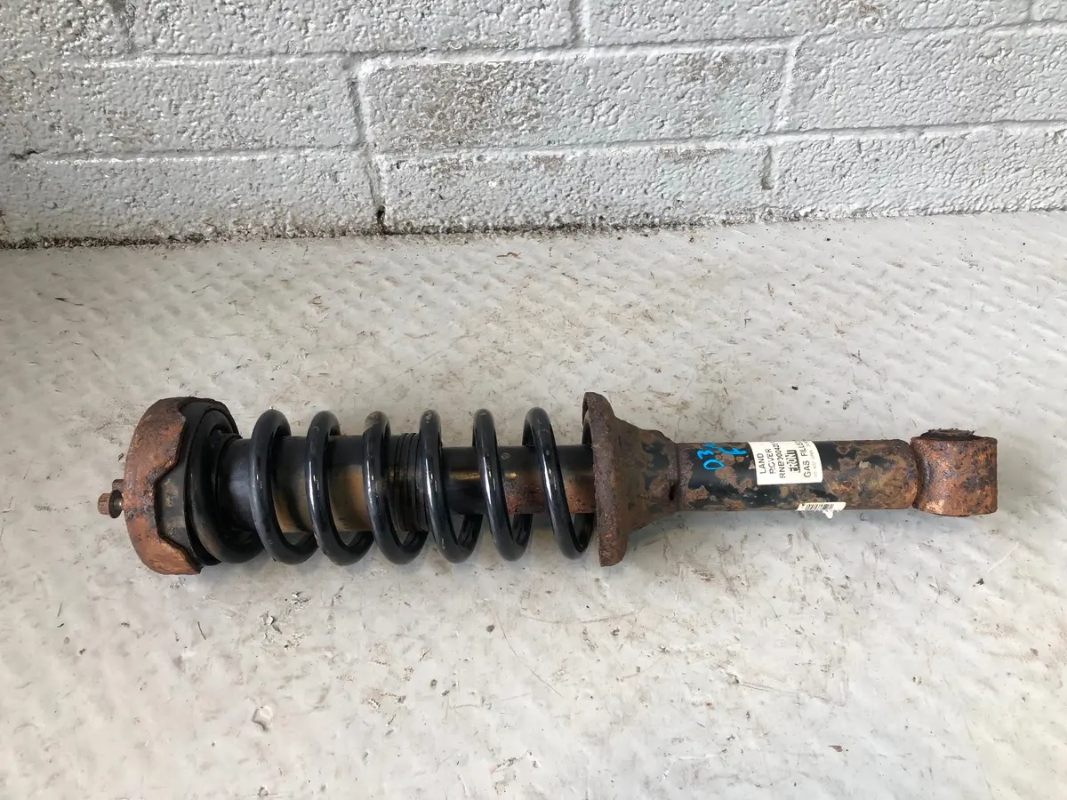 Discovery 3 Front Suspension Coil Shock Absorber Strut Land Rover Rnb000429 1